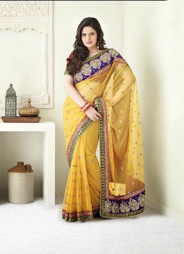 Zarine Khan in Yellow Colored Wedding Saree